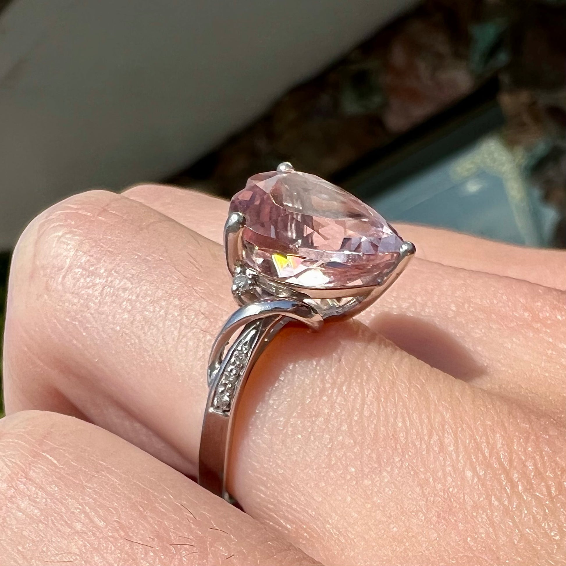 A white gold and diamond heart shaped morganite engagement ring.