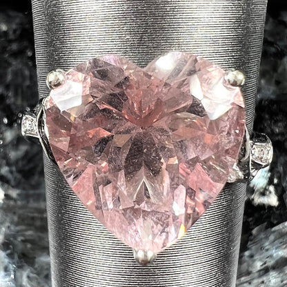 A white gold and diamond heart shaped morganite engagement ring.