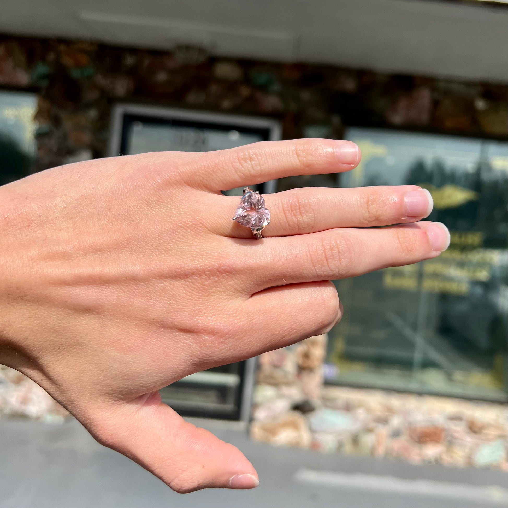 A white gold and diamond heart shaped morganite engagement ring.