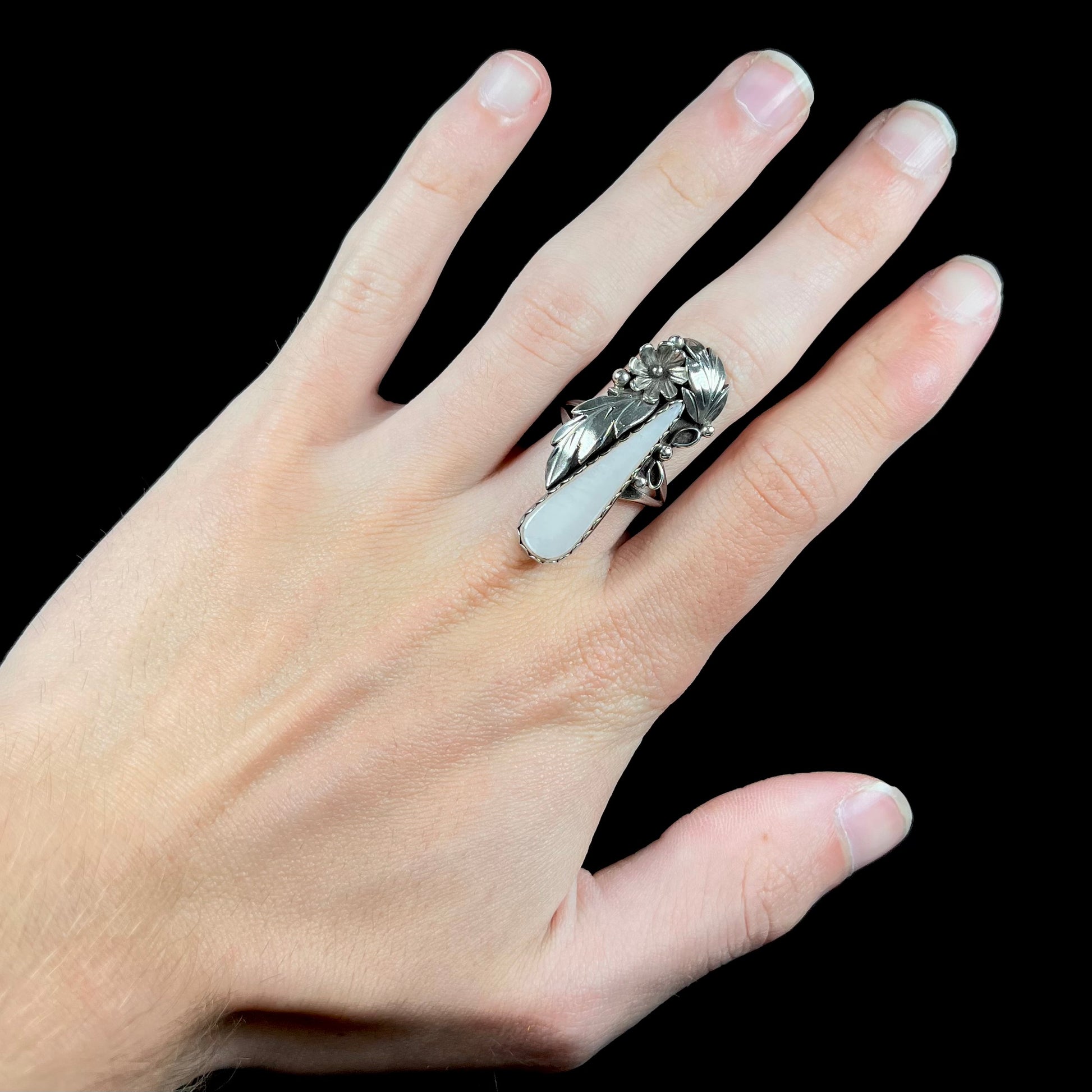 A sterling silver mother of pearl drop ring handmade in Navajo style, signed "MORNINGSTAR."