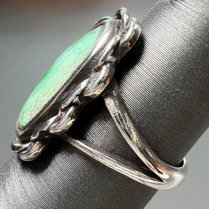 A handmade, split shank, sterling silver ring bezel set with a green variscite stone from Utah, USA.