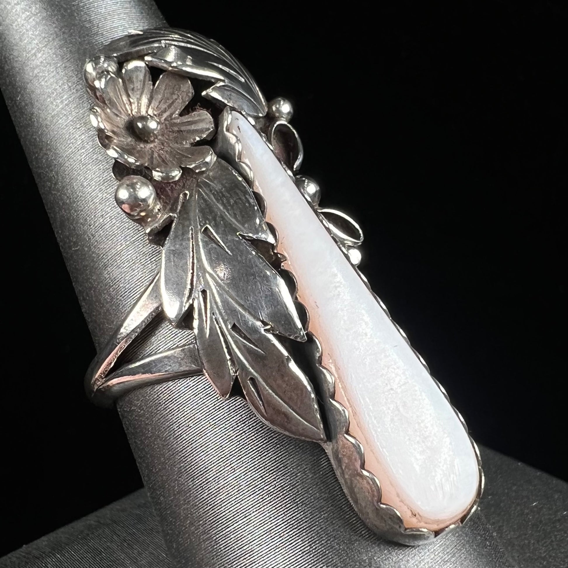 A sterling silver mother of pearl drop ring handmade in Navajo style, signed "MORNINGSTAR."