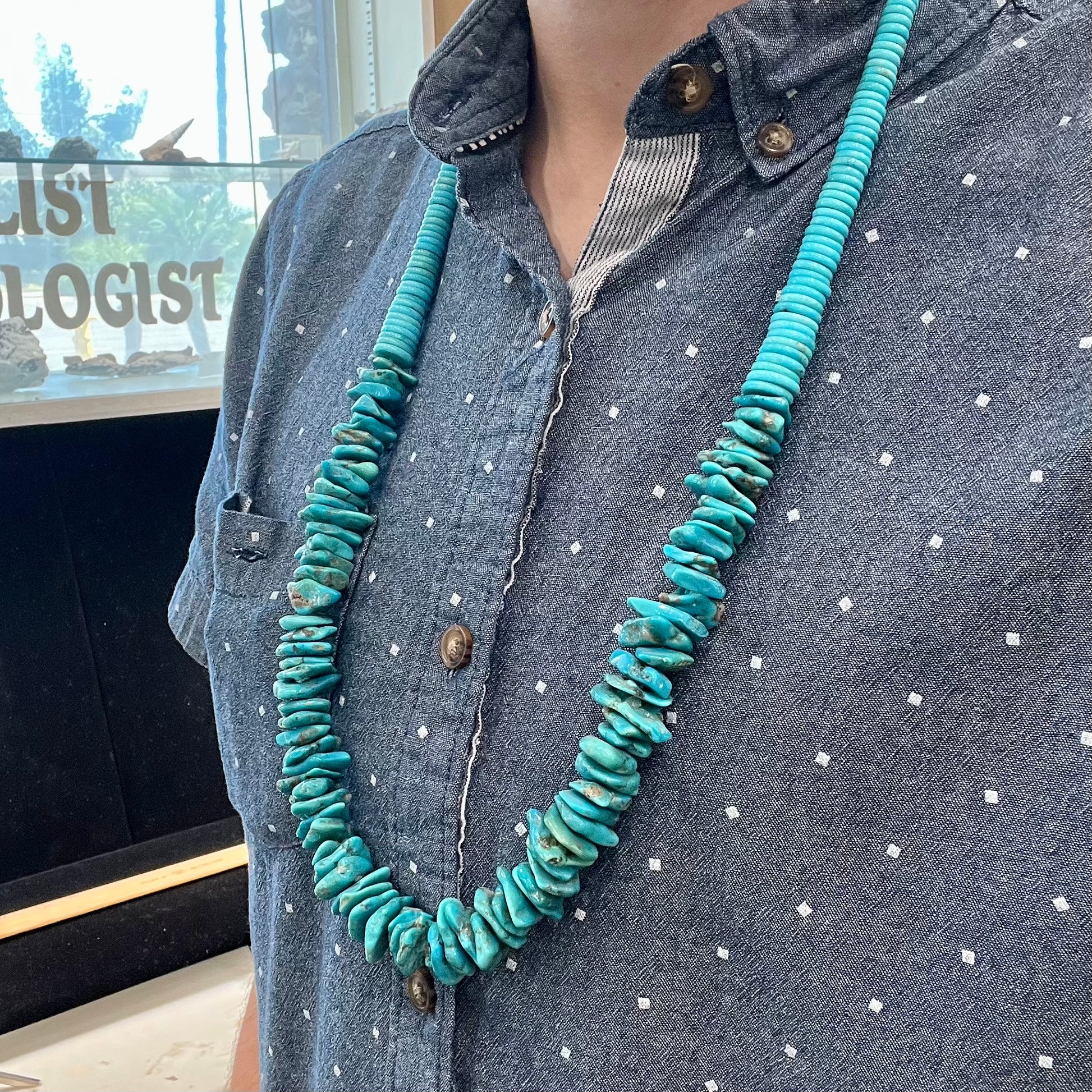 A men's turquoise stone bead necklace made from polished Kingman and Sleeping Beauty Mine turquoise.