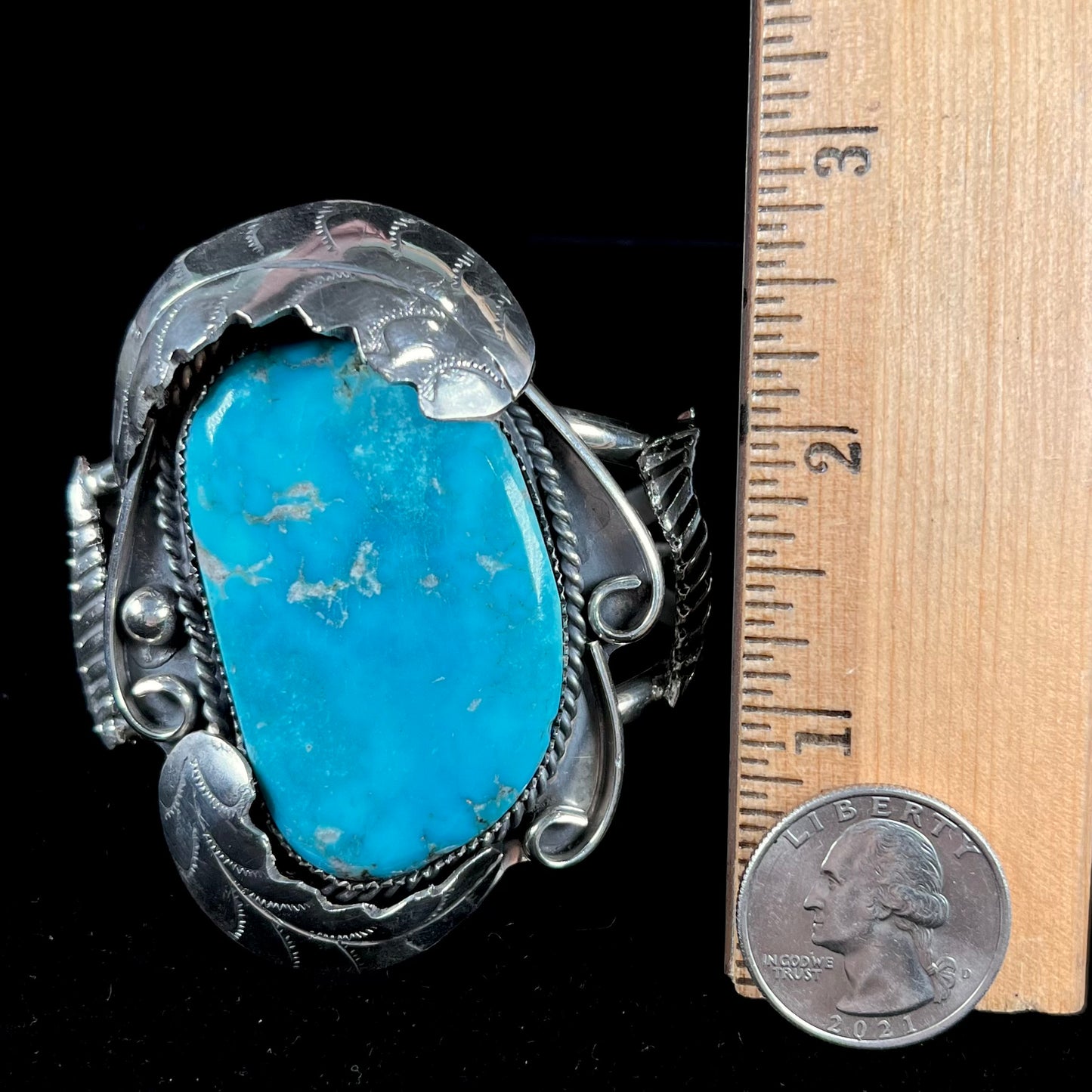 A Navajo Indian-made sterling silver cuff bracelet set with a Sleeping Beauty turquoise stone.