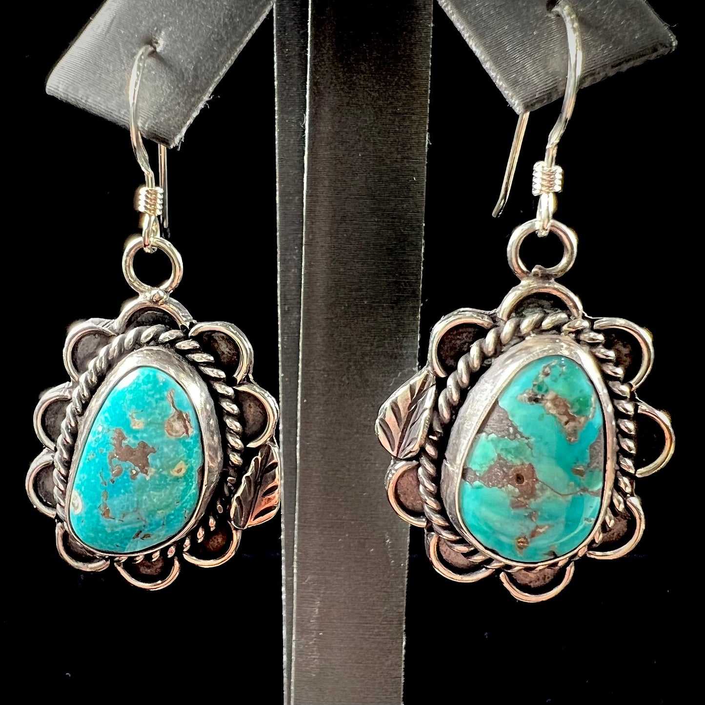 A pair of Navajo style silver Morenci turquoise dangle earrings.