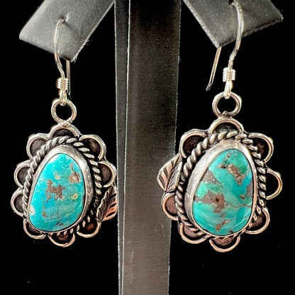 A pair of Navajo style silver Morenci turquoise dangle earrings.