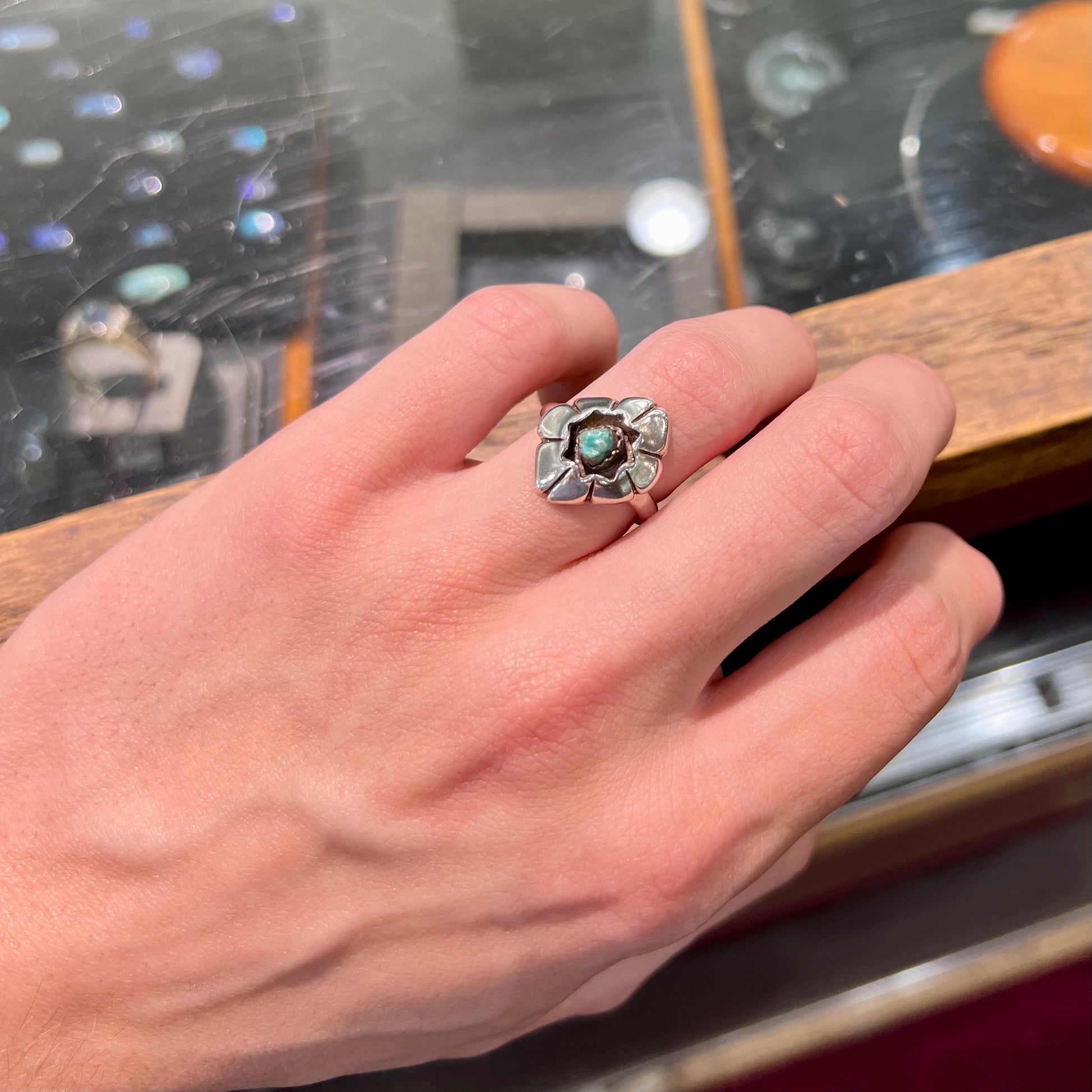 A handmade, sterling silver Native American turquoise nugget ring.