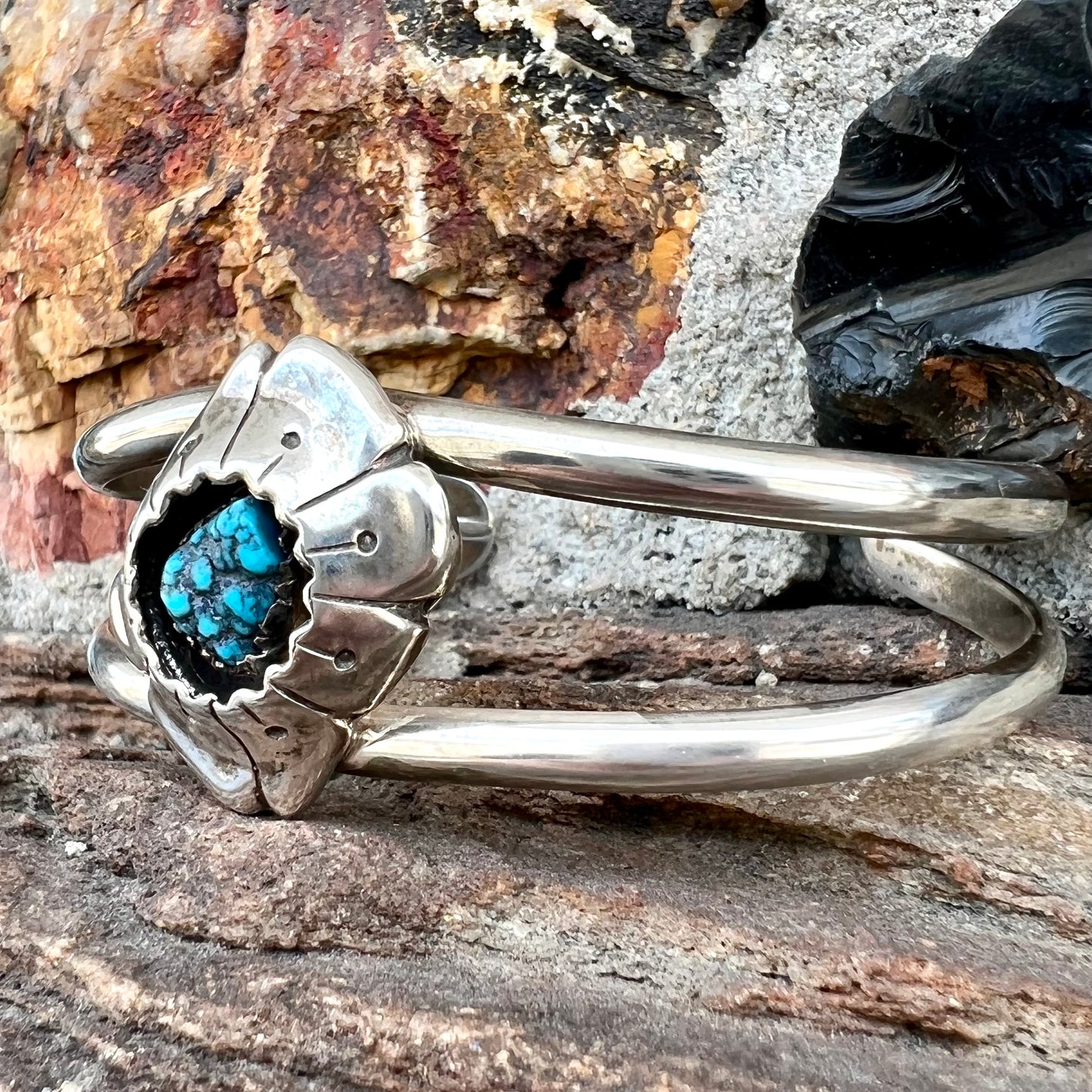 A Navajo style rough turquoise nugget silver cuff bracelet.
