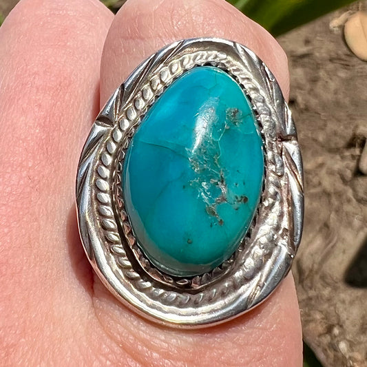 A men's sterling silver freeform cabochon cut turquoise ring.