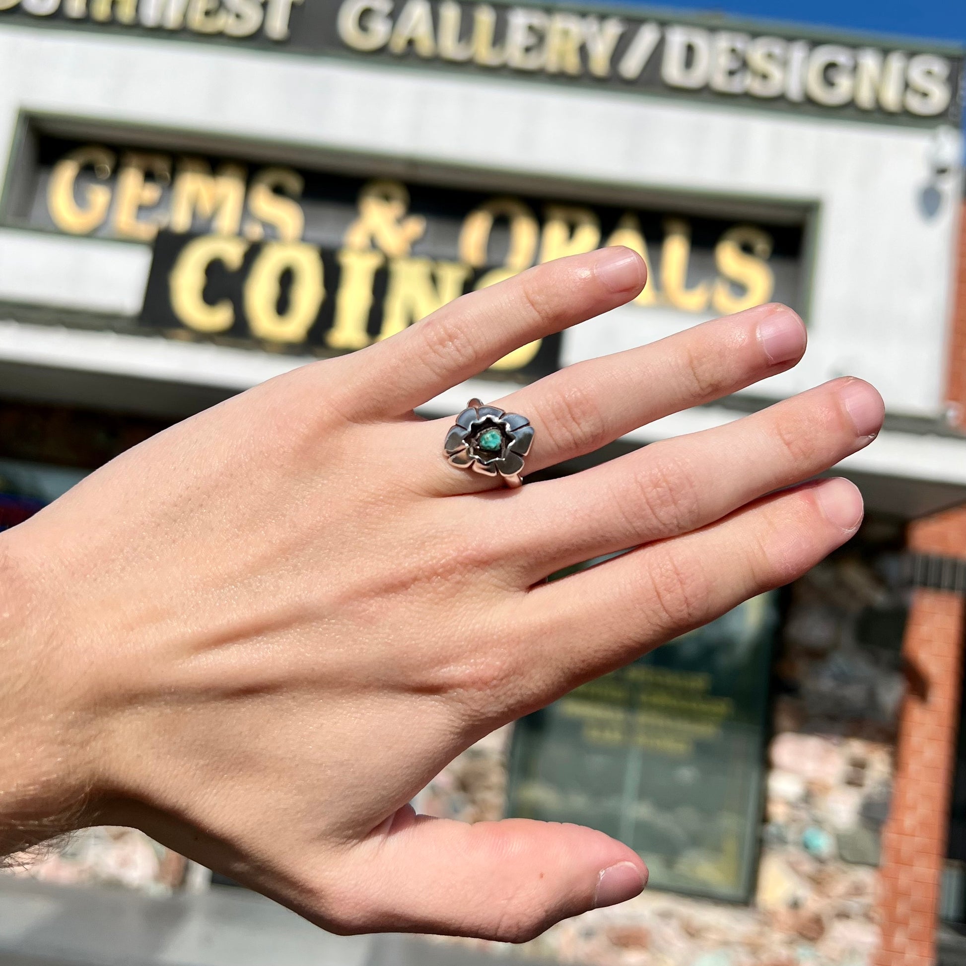 A handmade, sterling silver Native American turquoise nugget ring.