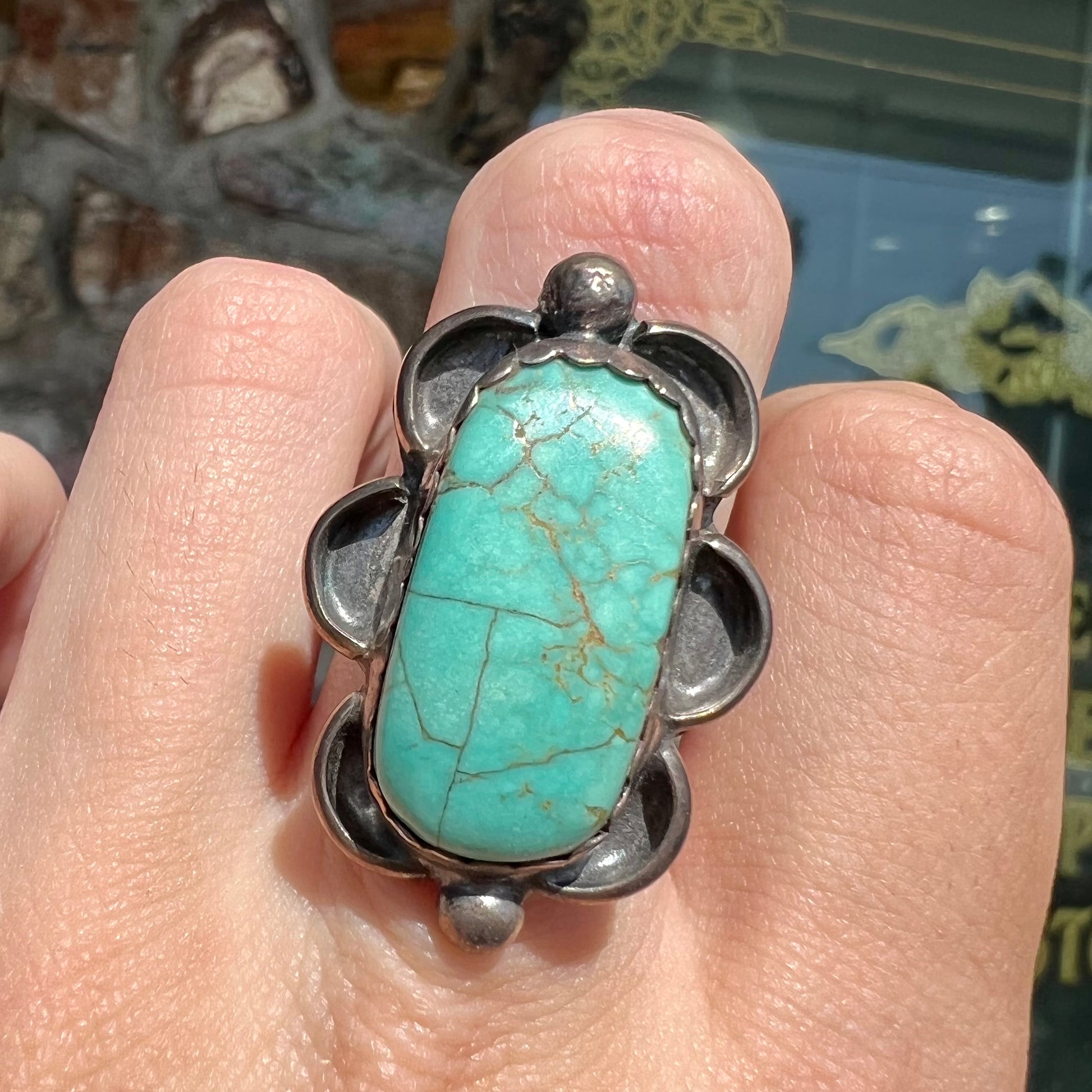 An estate sterling silver turquoise ring.  The ring was handmade by Navajo artist, Roy Buck.