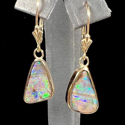 A pair of Australian boulder opal dangle earrings.