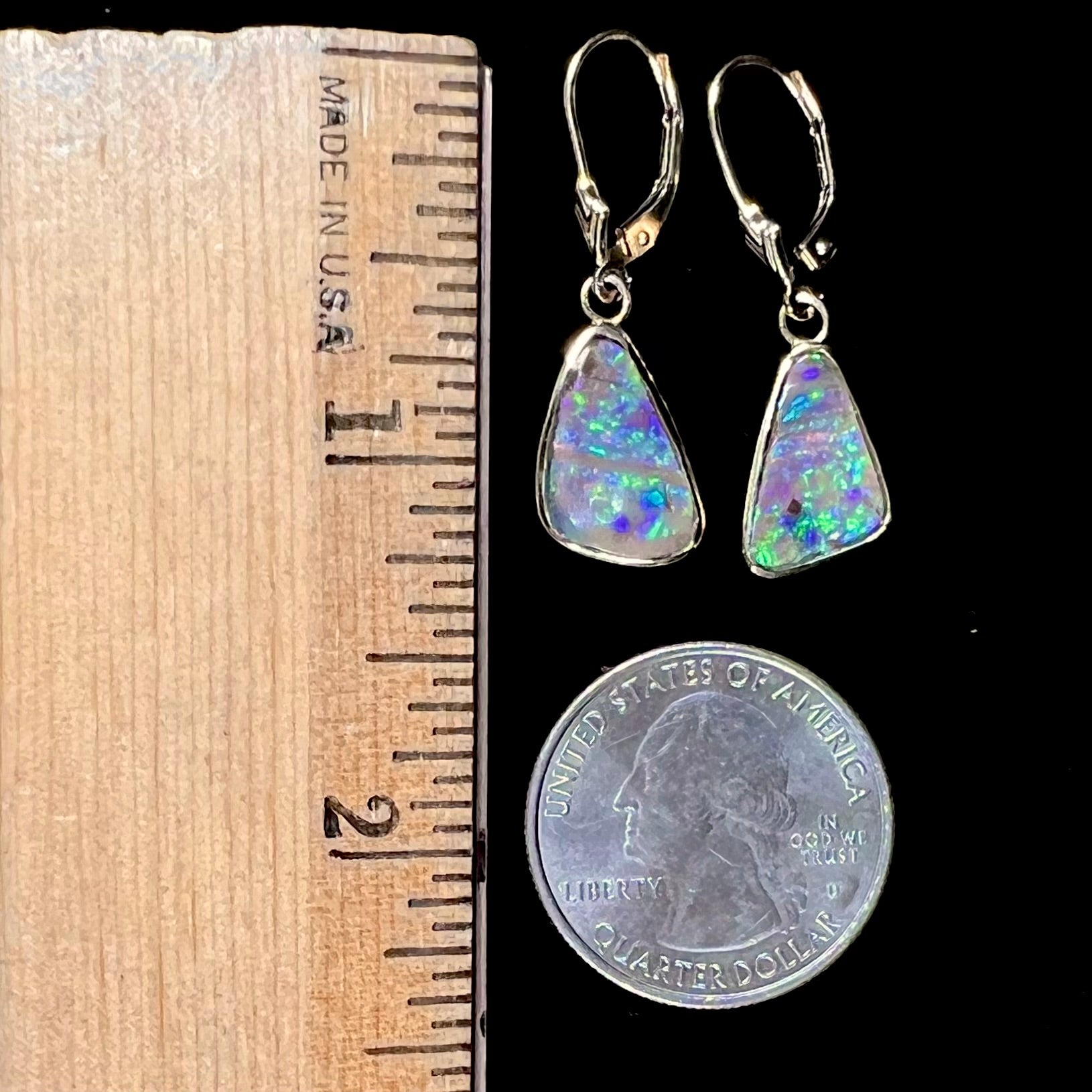 A pair of Australian boulder opal dangle earrings.