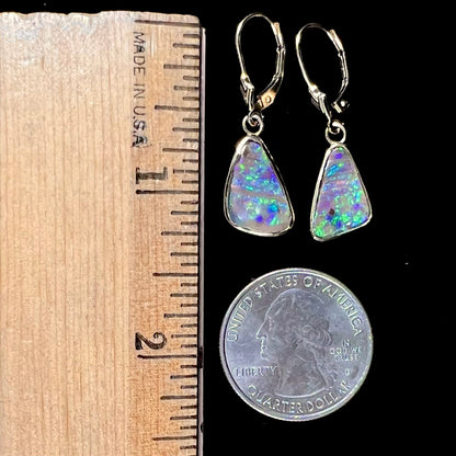 A pair of Australian boulder opal dangle earrings.