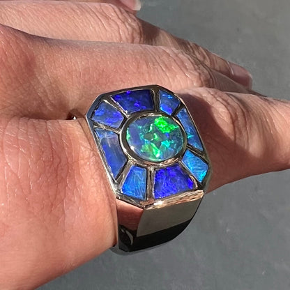 A men's white gold ring inlay set with Lightning Ridge, Austalian black crystal opal.