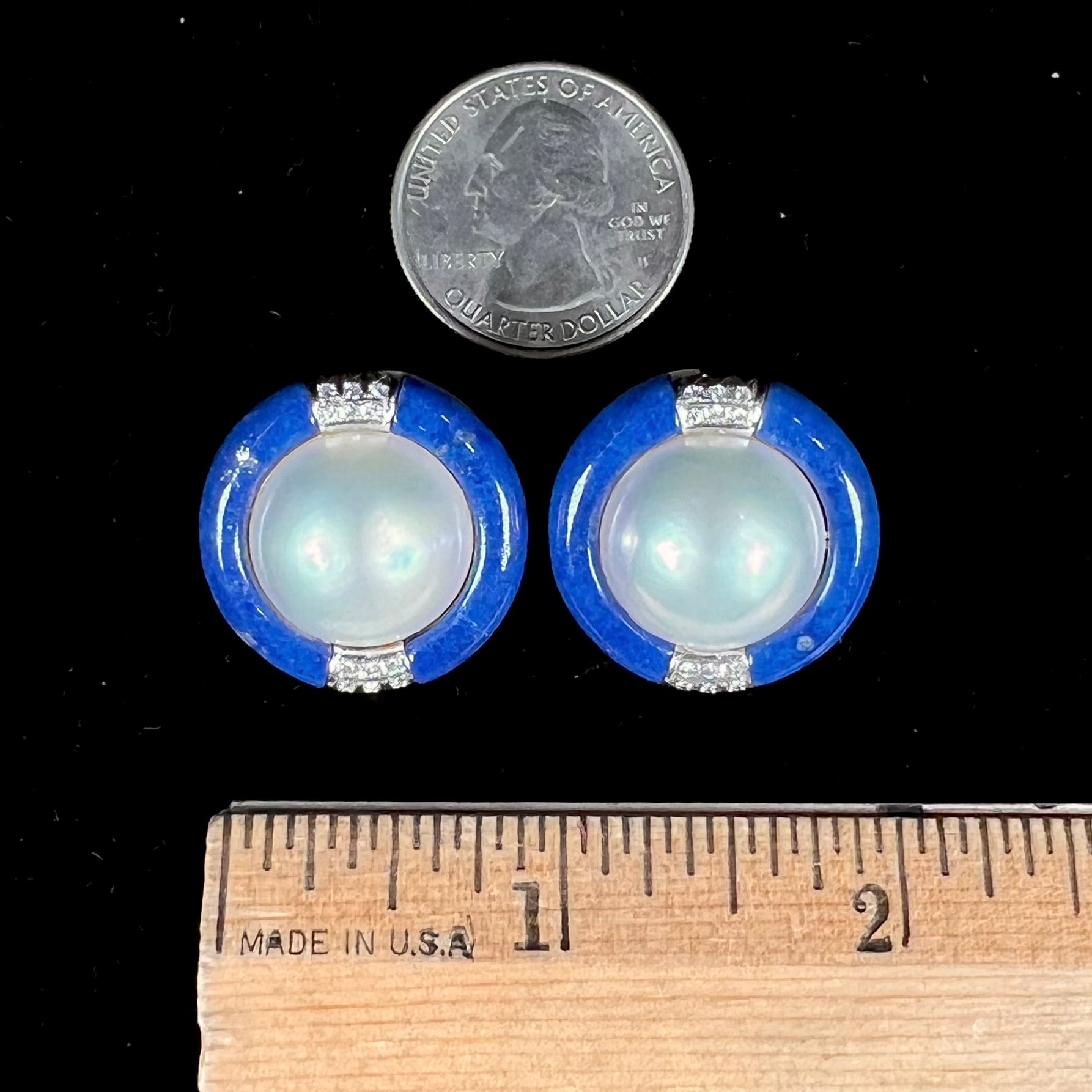 A pair of mabe pearl earrings set into lapis lazuli stone inlay with diamond accents.