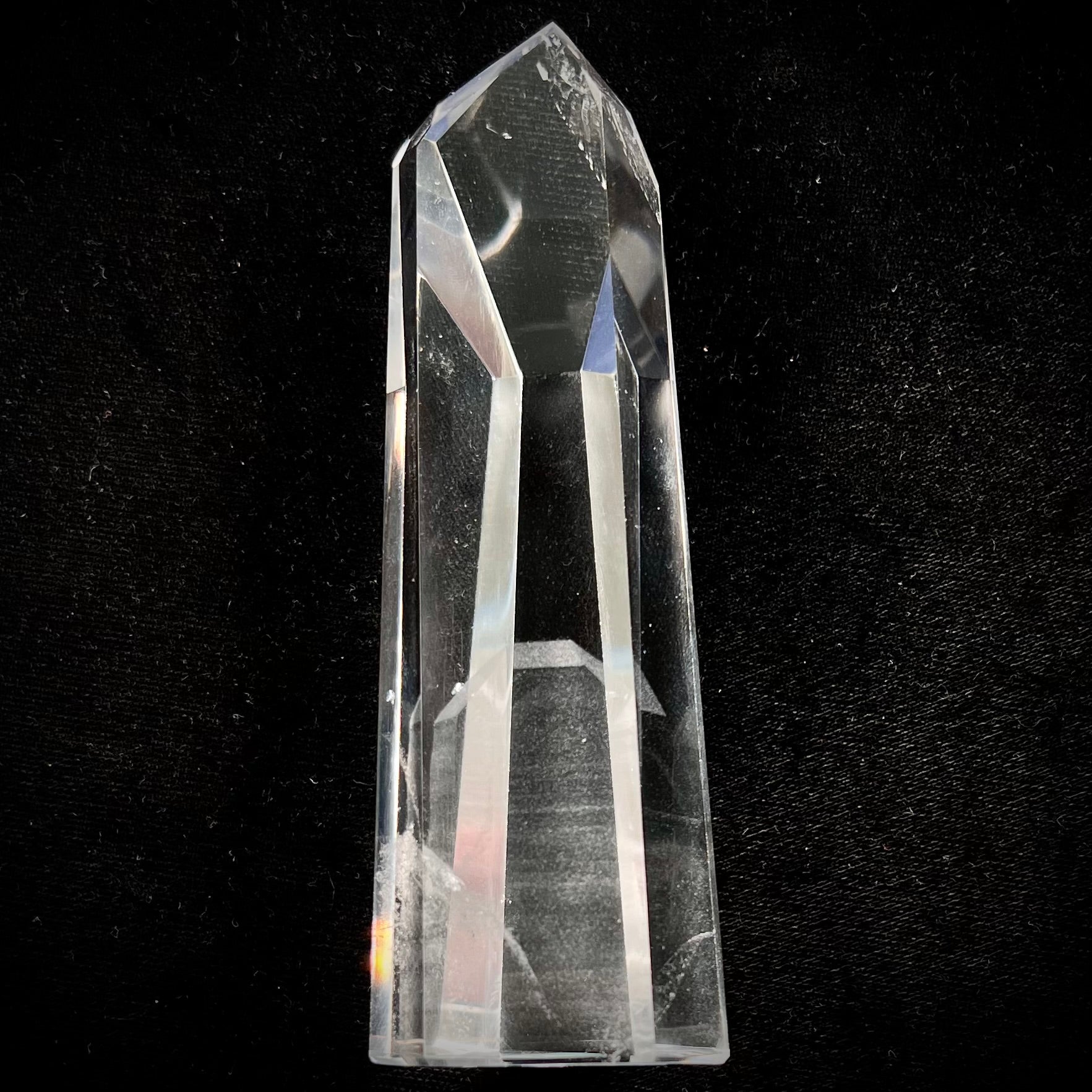 A 5.5 inch clear quartz crystal with a tabular quartz phantom inclusion.
