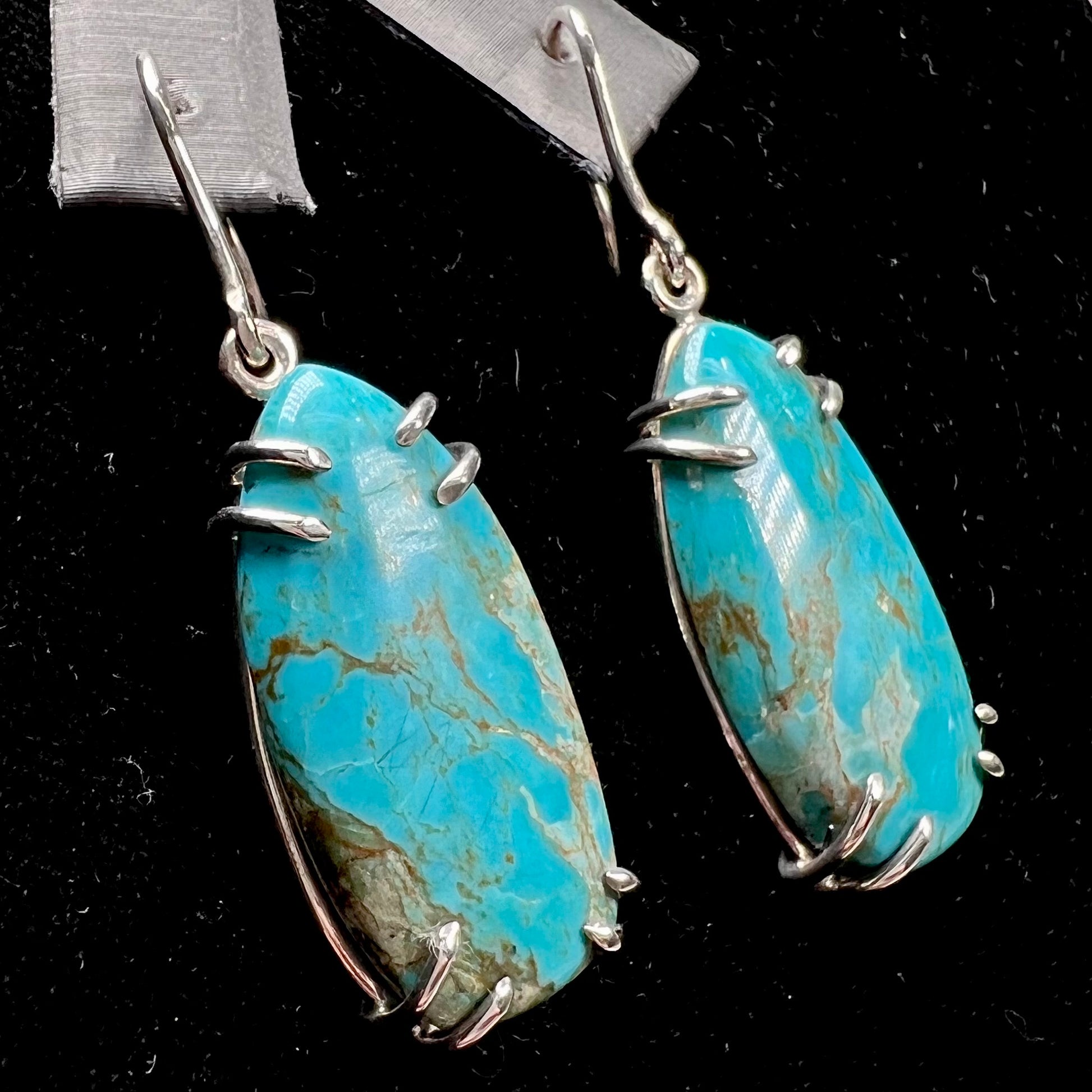 Sterling silver French wire earrings double prong set with cabochon cut turquoise from Pilot Mountain Mine.