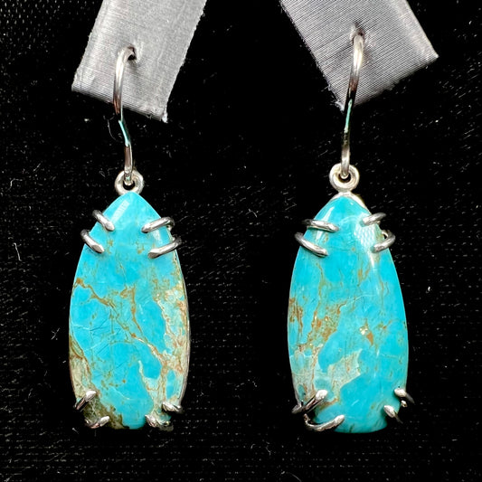 Sterling silver French wire earrings double prong set with cabochon cut turquoise from Pilot Mountain Mine.