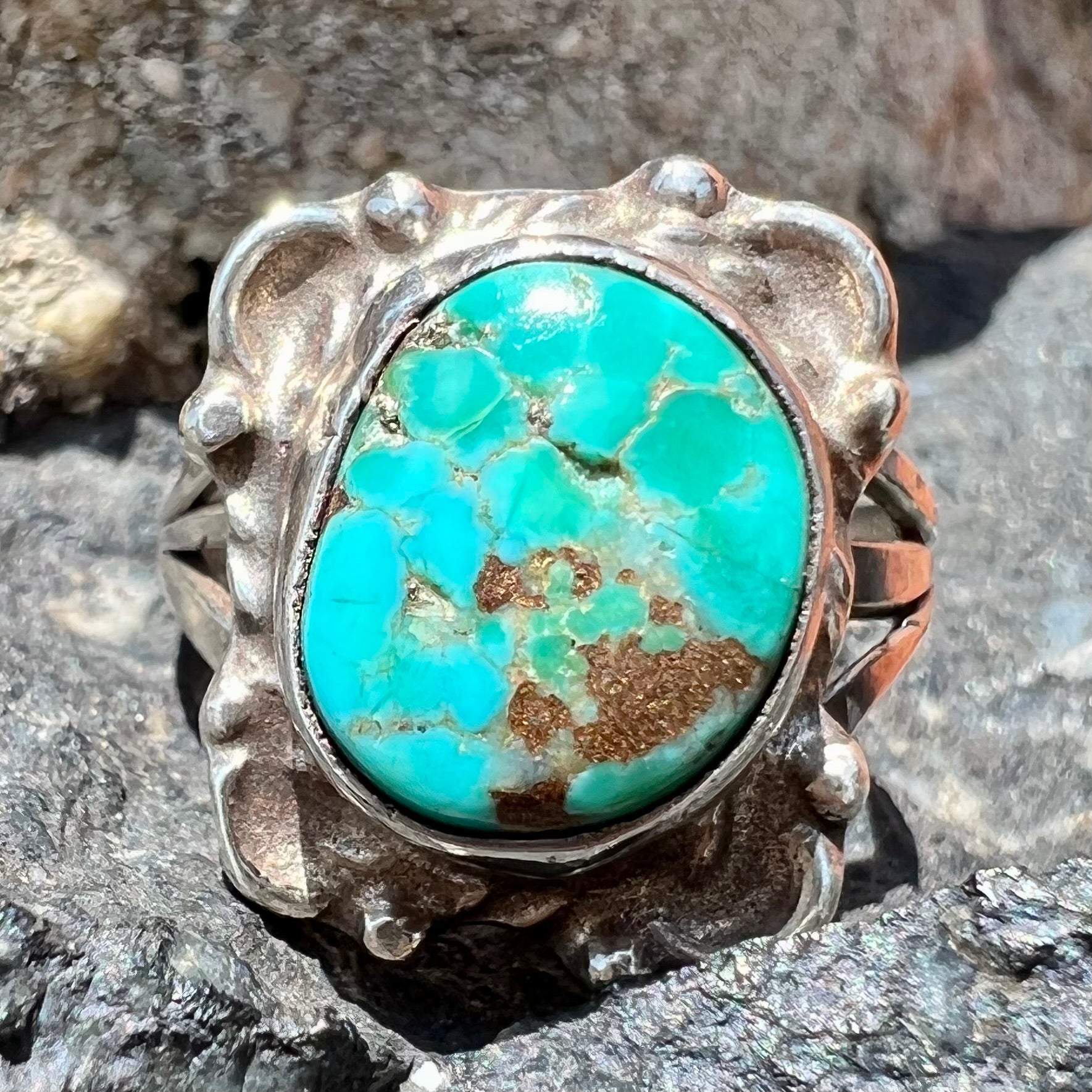 A handmade sterling silver turquoise ring set with a turquoise stone from Pilot Mountain.