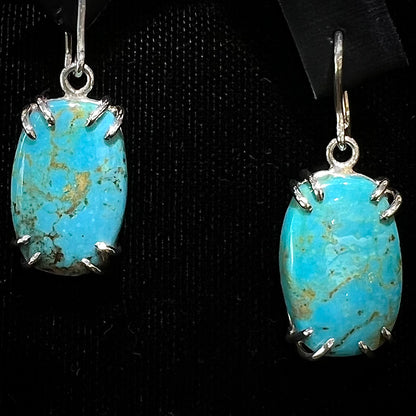 Sterling silver French wire earrings double prong set with cabochon cut Turquoise from Pilot Mountain Mine.