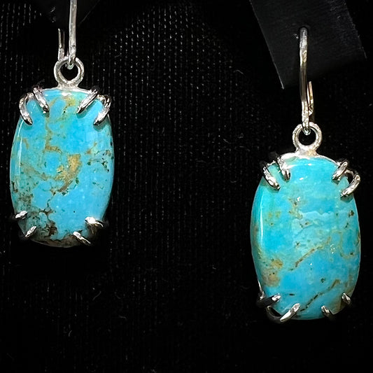 Sterling silver French wire earrings double prong set with cabochon cut Turquoise from Pilot Mountain Mine.