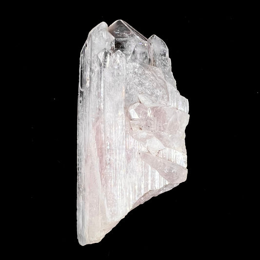 A 3.6 inch long pink danburite crystal specimen.  There are five twinned crystals coming off of a larger crystal.