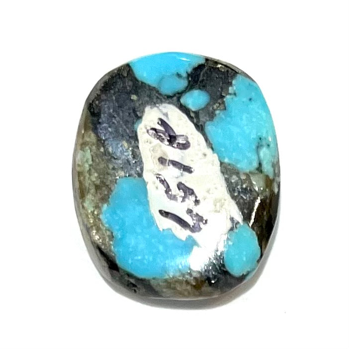 A loose turquoise stone from Pinto Valley Mine, Arizona.  The piece is blue with a black matrix.