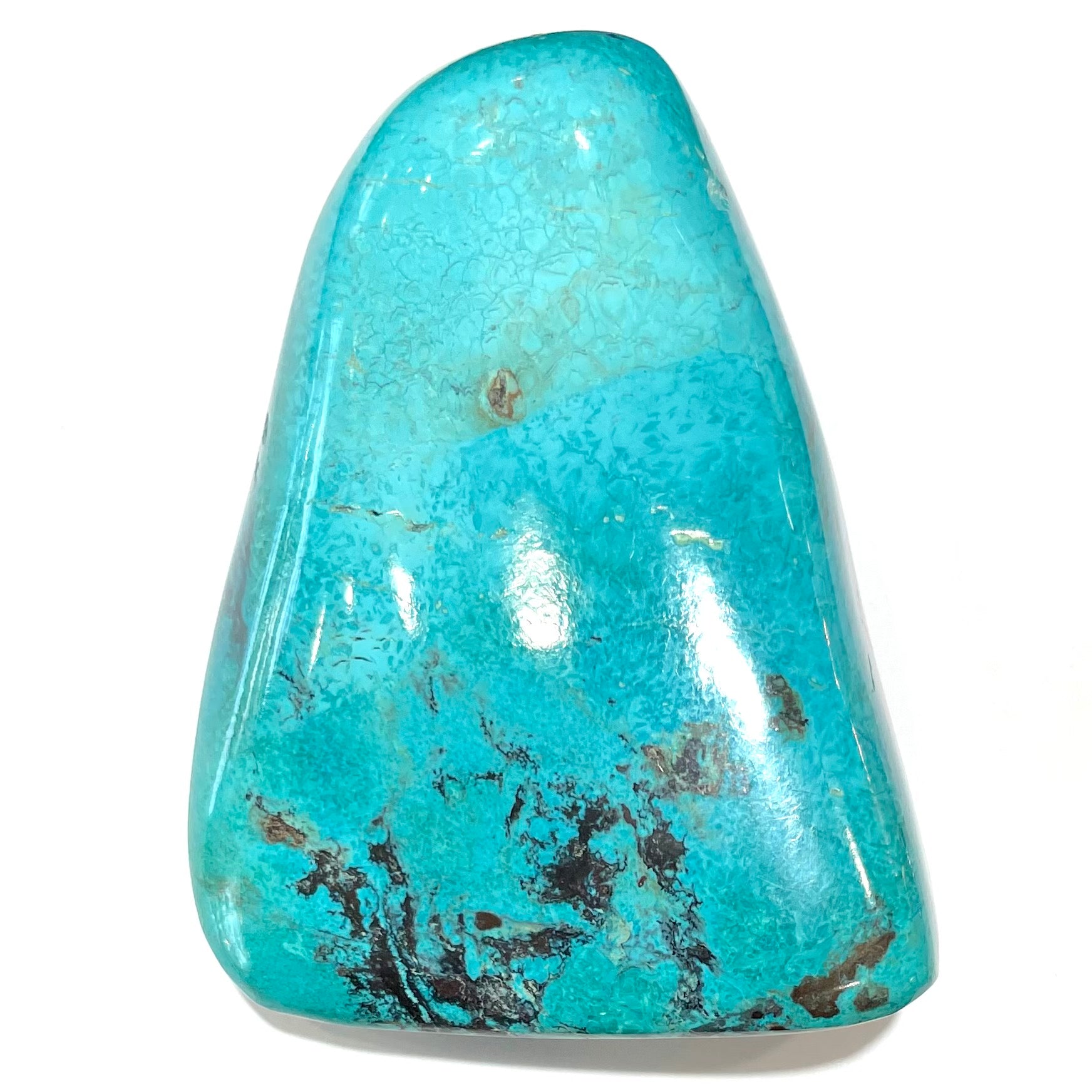 An exceptionally large, freeform shaped, polished turquoise specimen from Morenci, Arizona.
