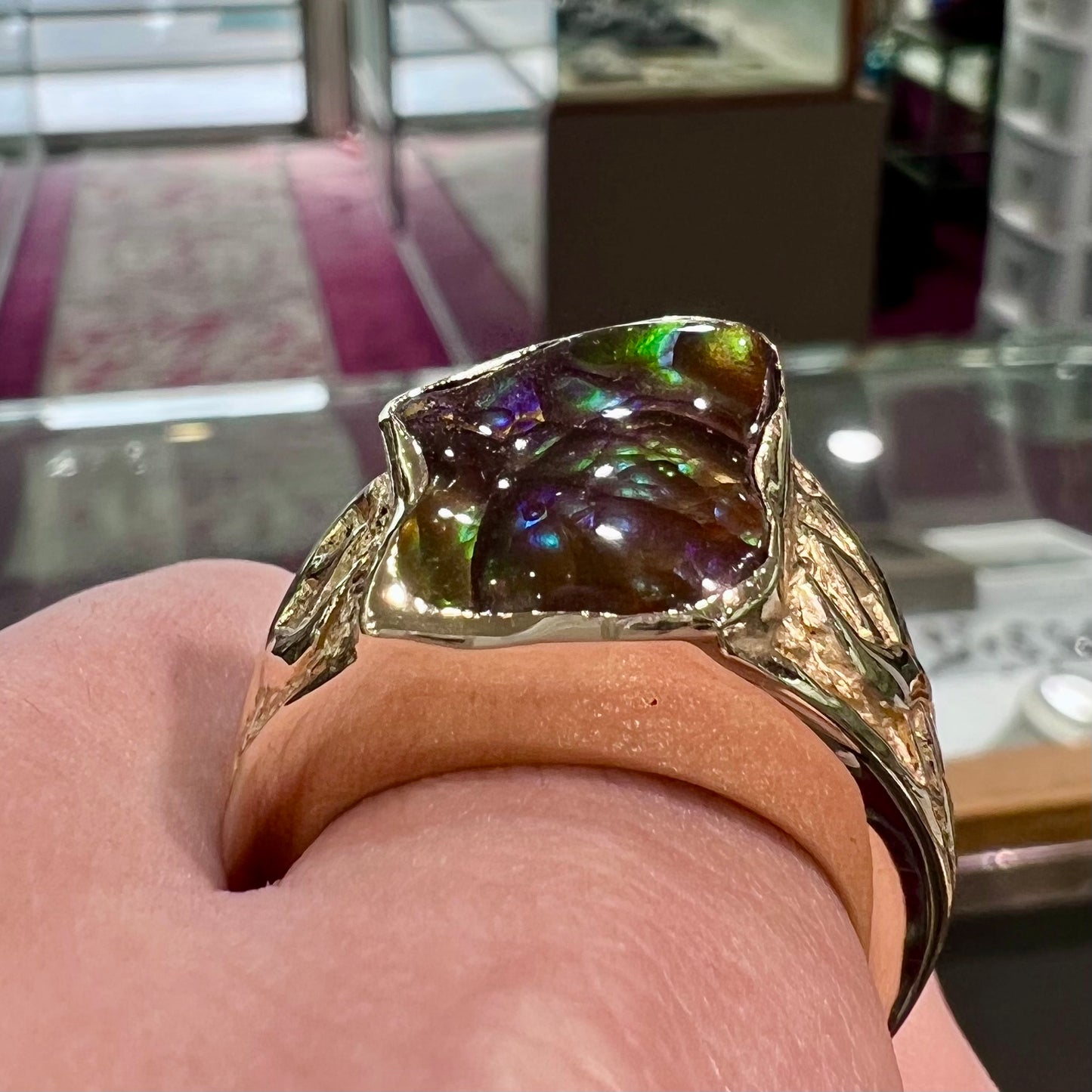Custom, heavy yellow gold men's ring set with fire agate from Deer Creek, Arizona.