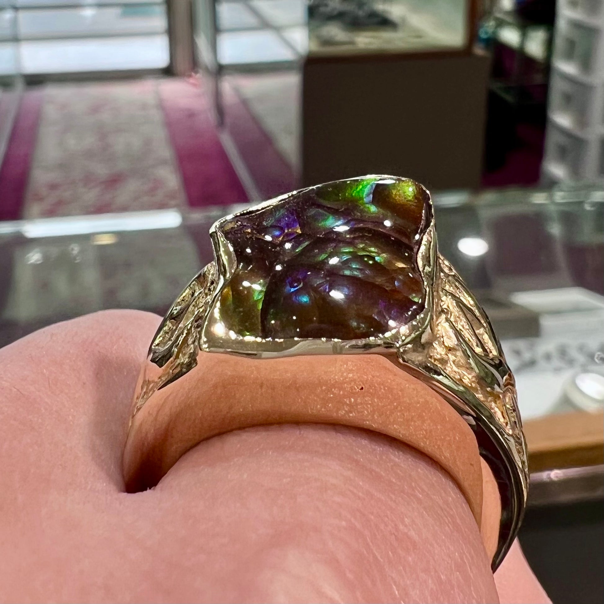 Custom, heavy yellow gold men's ring set with fire agate from Deer Creek, Arizona.