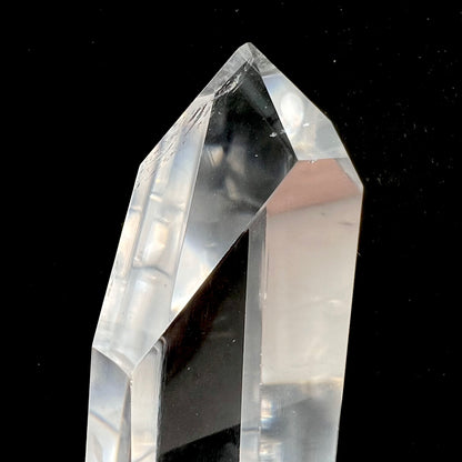 A 5.5 inch clear quartz crystal with a tabular quartz phantom inclusion.