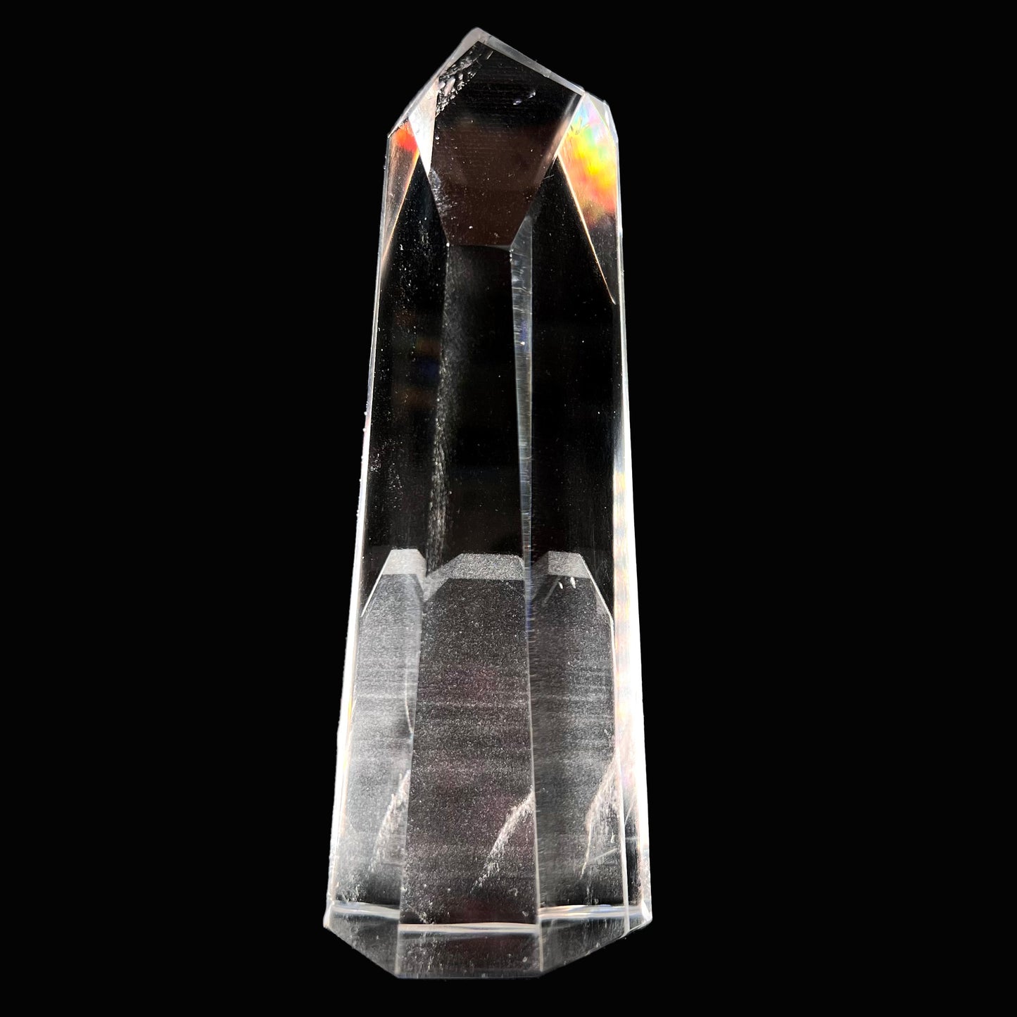 A 5.5 inch clear quartz crystal with a tabular quartz phantom inclusion.