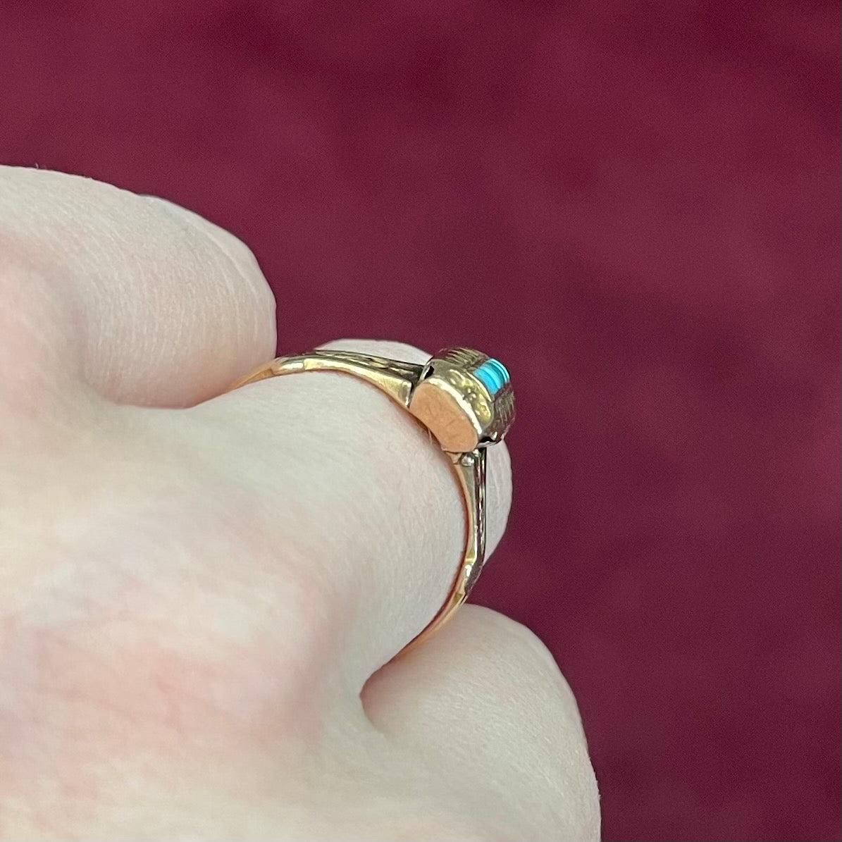Antique yellow gold ring set with five square turquoise stones, circa 1920's.