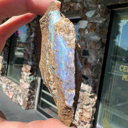 A rough boulder opal stone from Queensland, Australia.