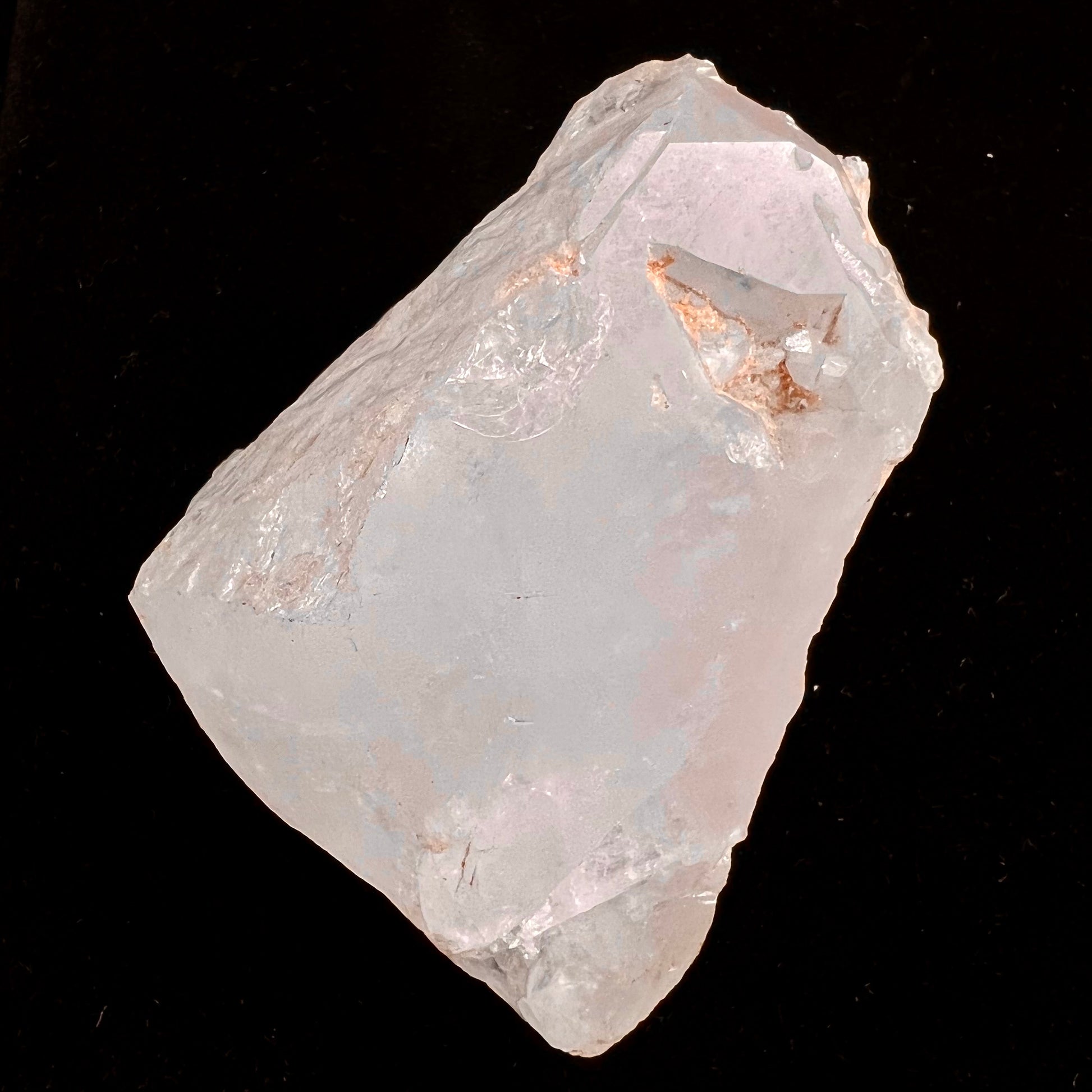 A rough, pink morganite crystal from the Stewart Mine in Pala, California.