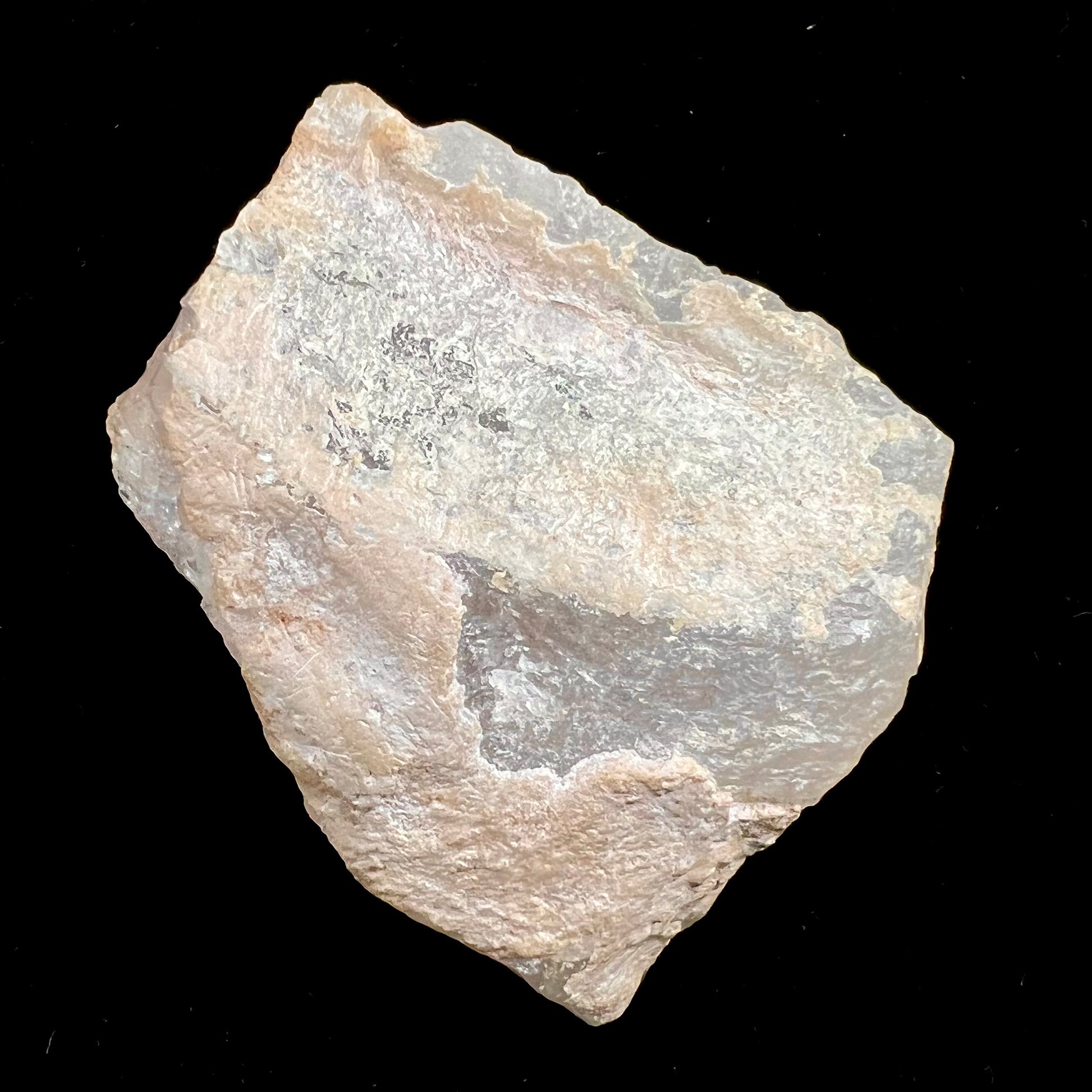 A rough, pink morganite crystal from the Stewart Mine in Pala, California.