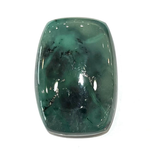 A loose, polished dark green turquoise stone from Royston Mining District, Nevada.