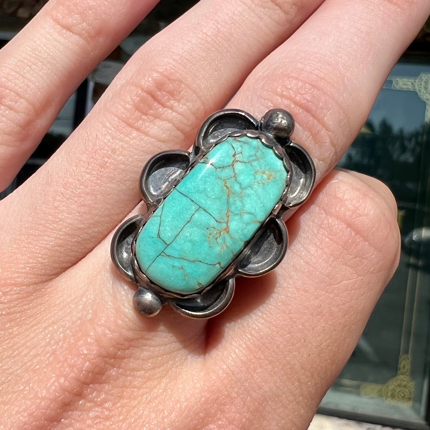 An estate sterling silver turquoise ring.  The ring was handmade by Navajo artist, Roy Buck.