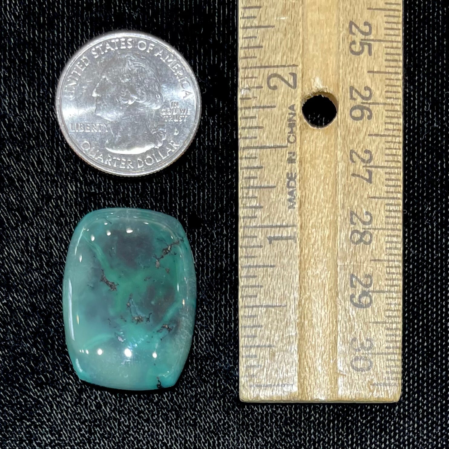 A loose, polished dark green turquoise stone from Royston Mining District, Nevada.