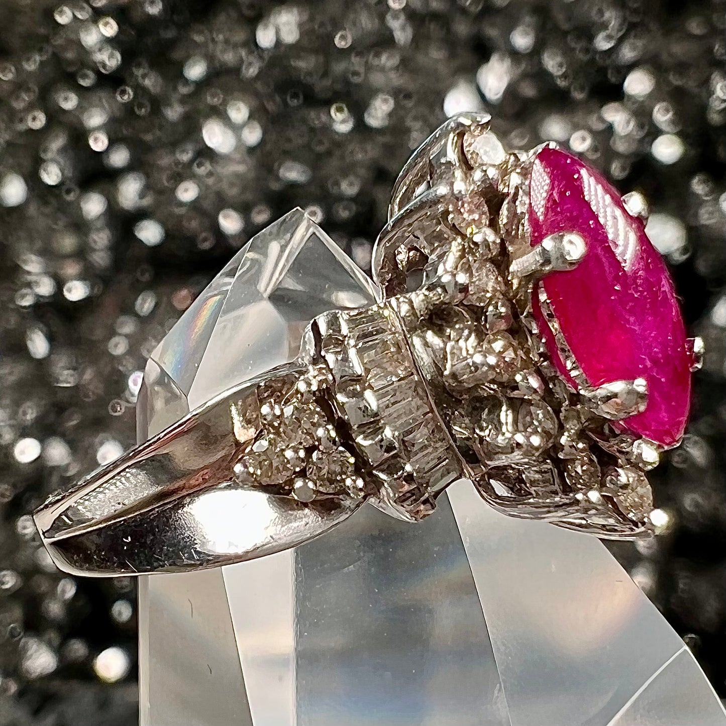 A vintage style white gold marquise cabochon cut ruby and diamond ring.