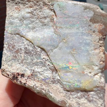 A lightly polished Painted Lady opal specimen from Andamooka, South Australia.