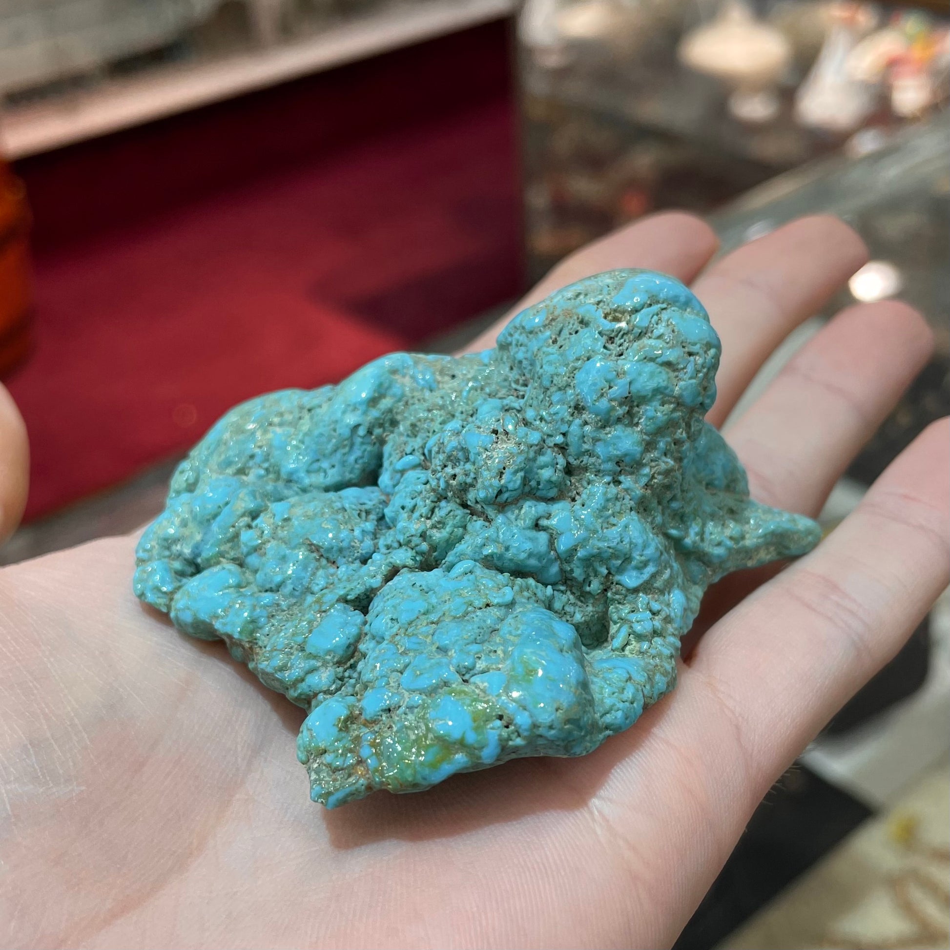 A loose, slightly polished natural turquoise nugget from Sleeping Beauty Mine, Arizona.