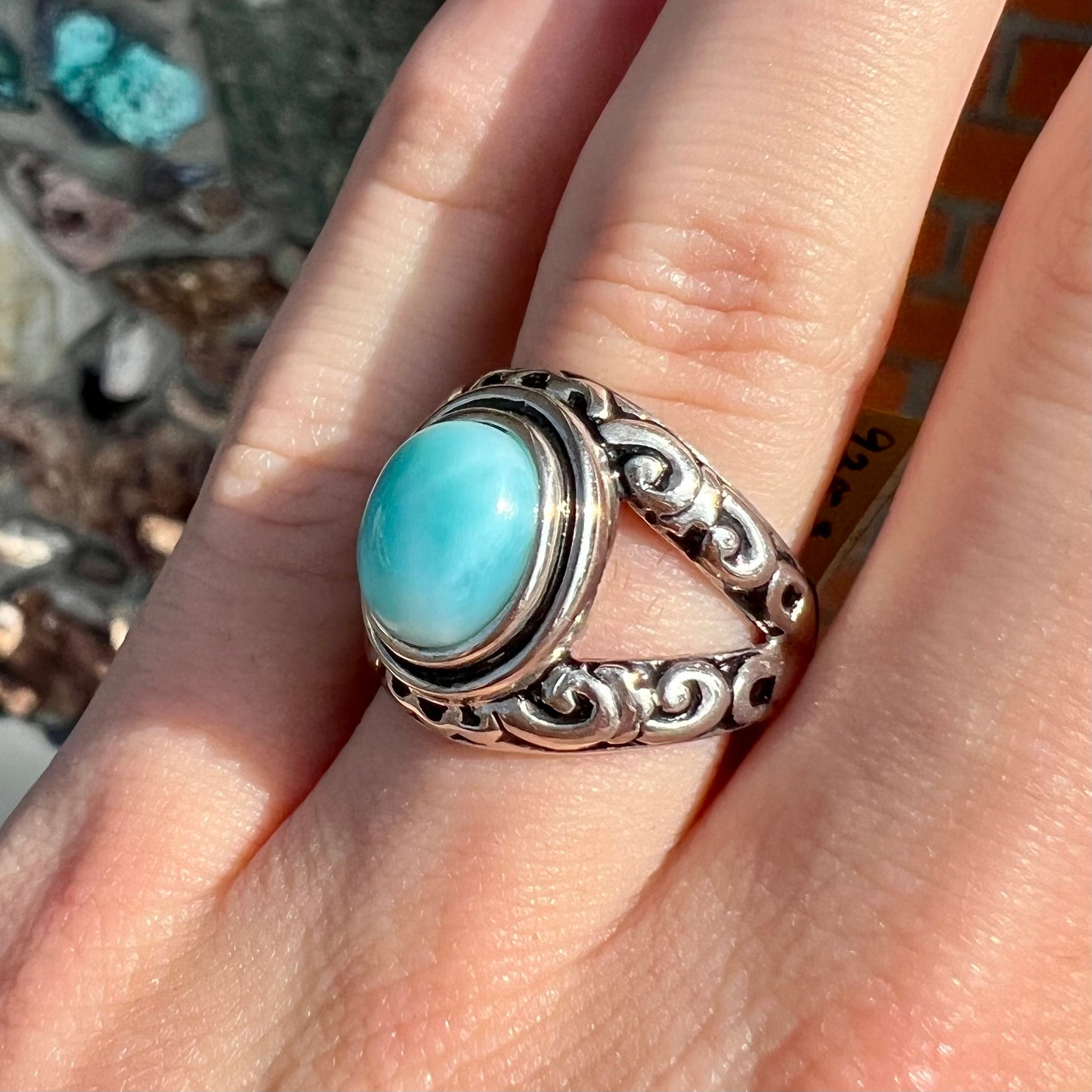 Sterling silver ring with black antiqued highlights set with blue larimar stone.