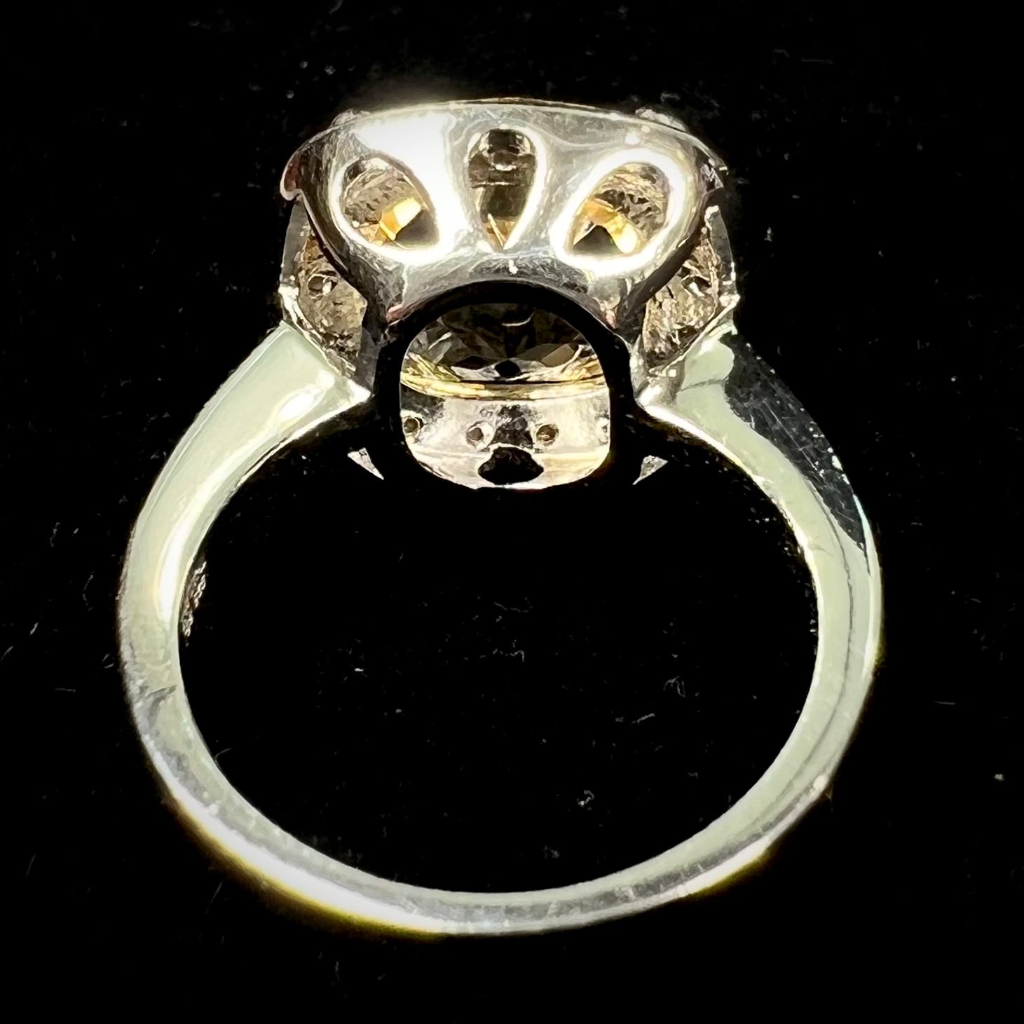 A silver cushion cut citrine and diamond halo ladies' ring.