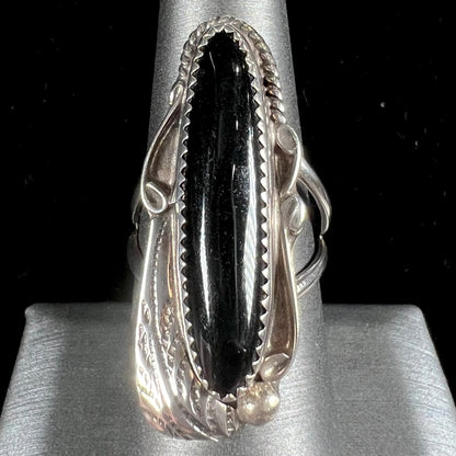 An elongated silver onyx ring handmade by Navajo artist, Tom Taylor.