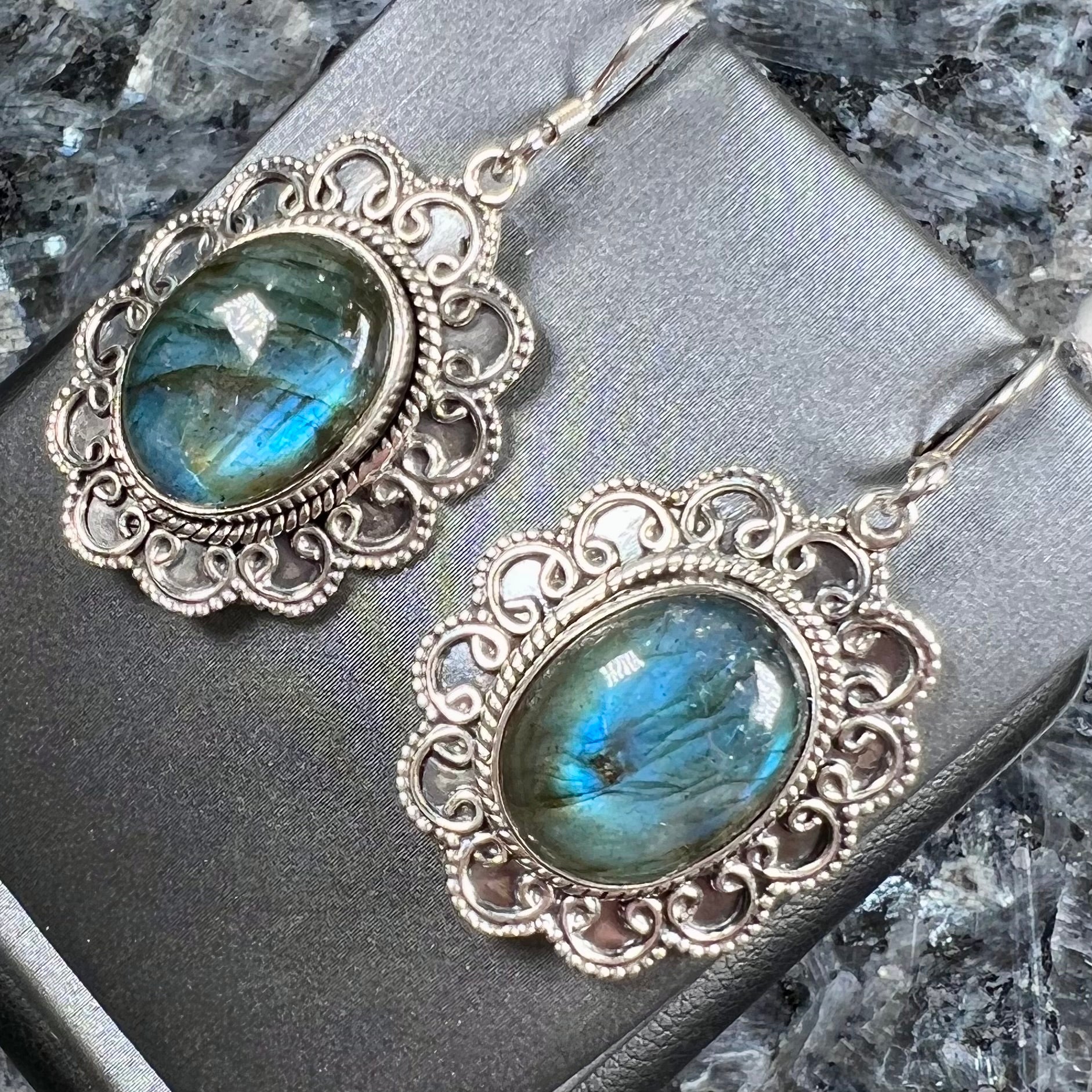 A pair of Southwest style sterling silver labradorite dangle earrings.