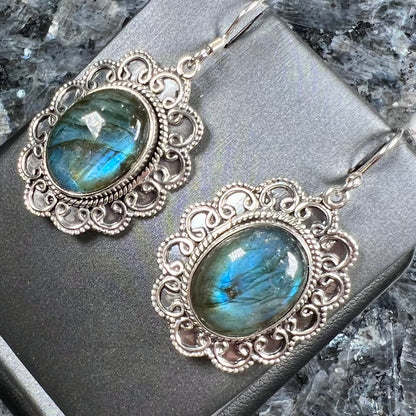 A pair of Southwest style sterling silver labradorite dangle earrings.