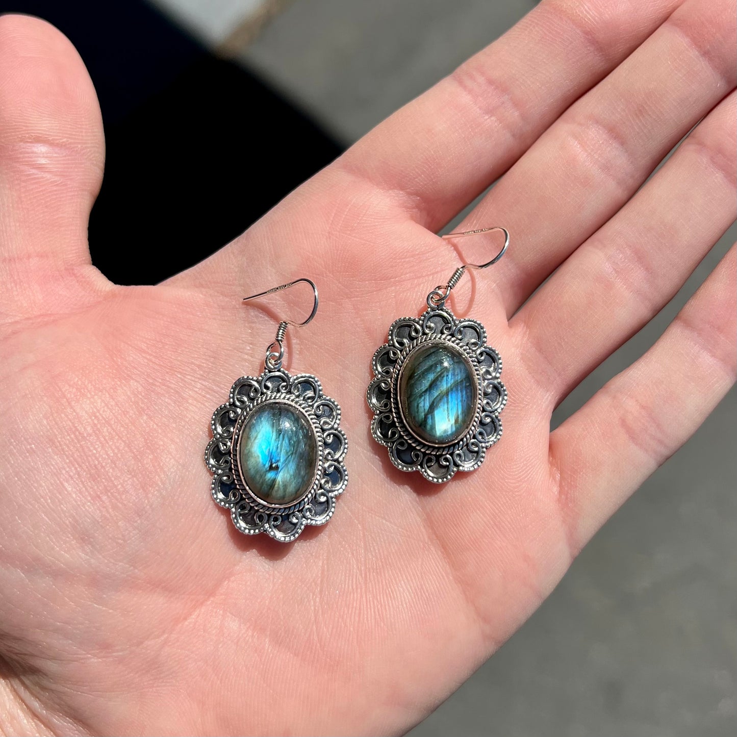 A pair of Southwest style sterling silver labradorite dangle earrings.