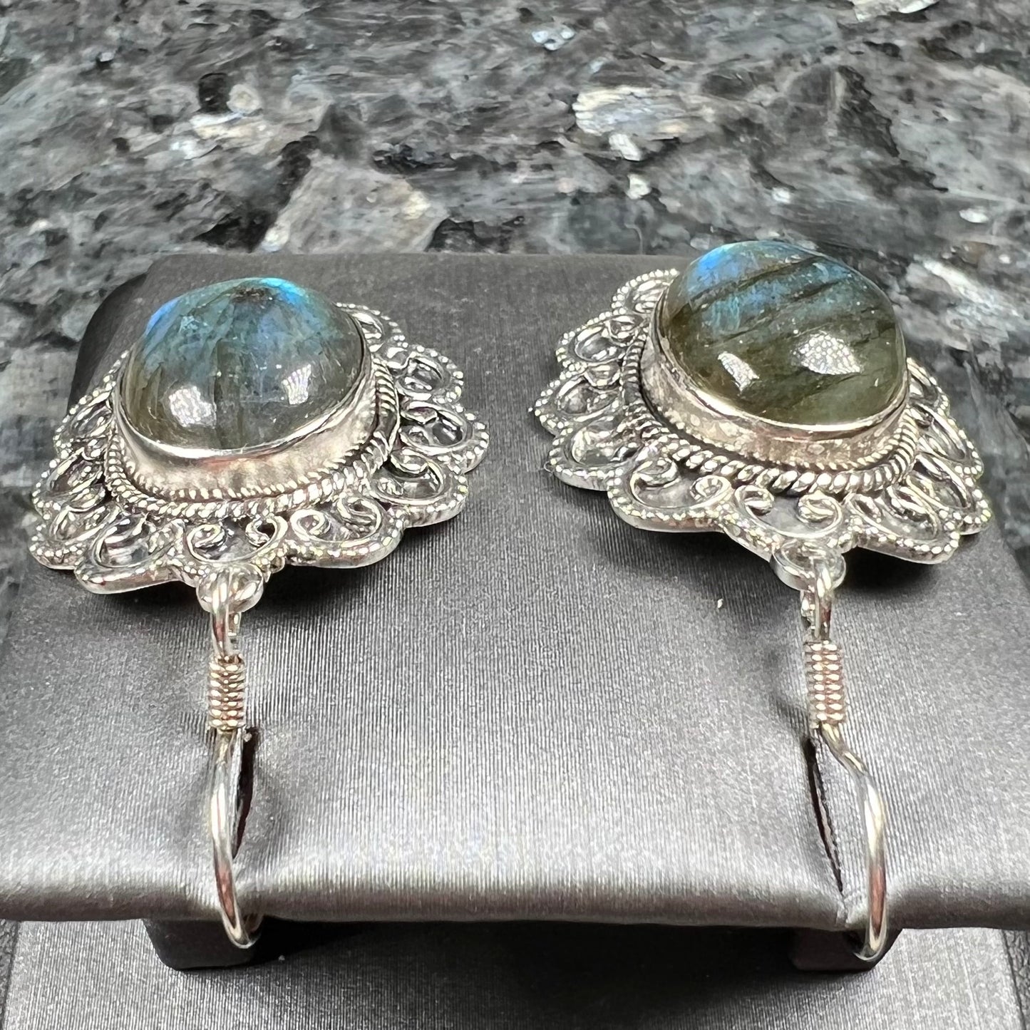 A pair of Southwest style sterling silver labradorite dangle earrings.